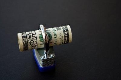 Jupiterimages/Photos.com/Getty Images Annuities lock away your money to build interest and payout later.
