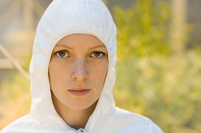 Image Source/Stockbyte/Getty Images Women pursuing a hazmat career should make physical endurance a priority, due to long hours standing or removing toxic chemicals.