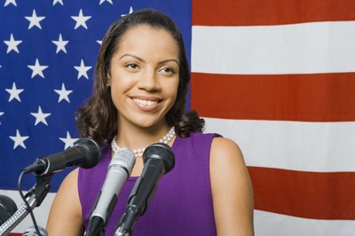 Jupiterimages/Creatas/Getty Images Woo crowds with exceptional speaking skills.