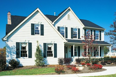 Comstock/Comstock/Getty Images Title insurance protects a home against liens or other claims.