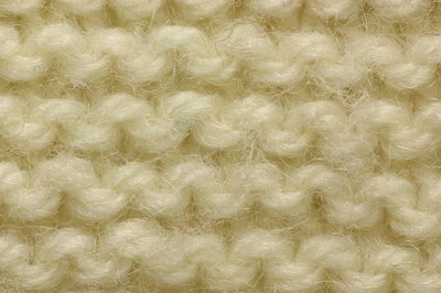 Hemera Technologies/AbleStock.com/Getty Images If you catch your pet chowing down happily on wool, she may have pica.
