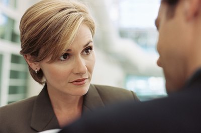 BananaStock/BananaStock/Getty Images Salaries for office manager in the film industry are close to six figures.