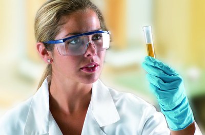 Photos.com/liquidlibrary/Getty Images Pathologists study tissue samples to help diagnose diseases.