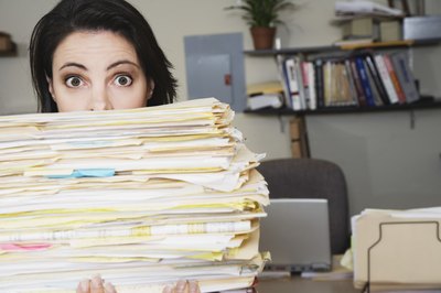 Jupiterimages/Brand X Pictures/Getty Images Recent economic downturns have left many workers feeling frazzled and burned out.