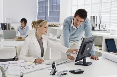 Jupiterimages/Pixland/Getty Images Effective constructive criticism helps build productive relationships.