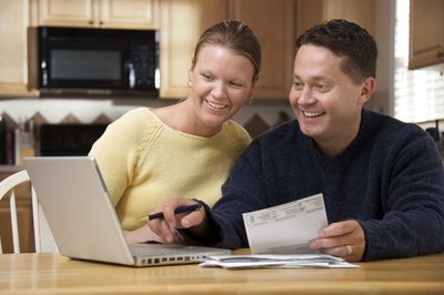 Jupiterimages/Comstock/Getty Images List all your debts to help you form a plan.