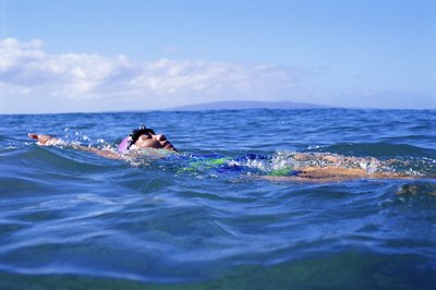 Jupiterimages/Photos.com/Getty Images You can use any stroke you want in the swim portion.