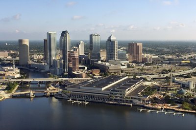 Jupiterimages/Comstock/Getty Images If you work in Tampa but live in Atlanta, you pay Georgia taxes.