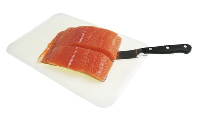 Thinkstock/Comstock/Getty Images Eating salmon is a good choice for adding both niacin and vitamin B12 to your diet.