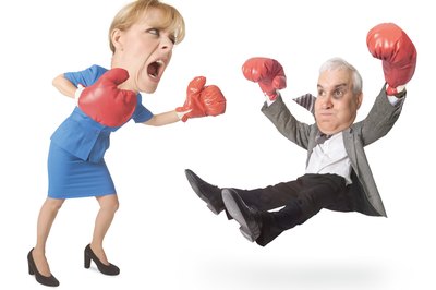 Photodisc/Photodisc/Getty Images Don't pick fights at work or you may end up on the wrong side of the law.