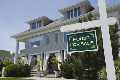 Jupiterimages/Comstock/Getty Images Consider current debt obligations in mortgage affordability calculations.