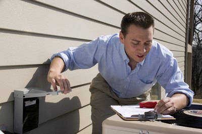 Jupiterimages/liquidlibrary/Getty Images FHA inspections must be conducted during the escrow period.
