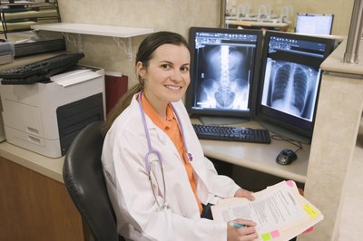 Jupiterimages/Creatas/Getty Images Radiologists work with other physicians to make accurate diagnoses.