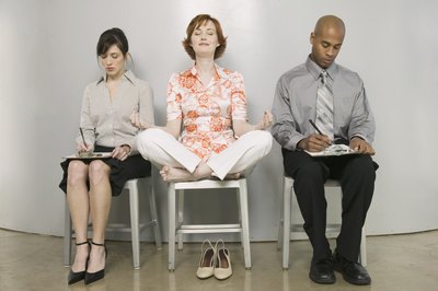 Brand X Pictures/Brand X Pictures/Getty Images Meditation might help candidates reduce interview stress.