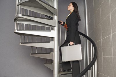 Creatas Images/Creatas/Getty Images Knee problems can make one flight of stairs feel like 20.