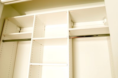 Jupiterimages/Photos.com/Getty Images Expensive closet systems are sometimes offered at budget prices in "as is" departments.
