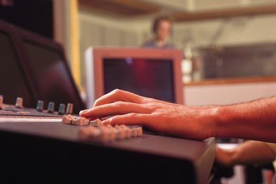 Comstock/Comstock/Getty Images Sound engineers can earn up to $150 an hour for high-budget recordings.