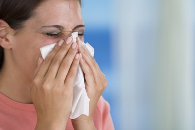 Comstock Images/Comstock/Getty Images When you're sick, the last thing you want to worry about is job security.