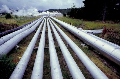 Hemera Technologies/AbleStock.com/Getty Images Oil pipeline investments pay cash dividends.