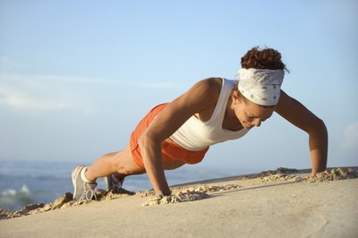 Thinkstock Images/Comstock/Getty Images Burpees are effective for fat burning and working your abs.