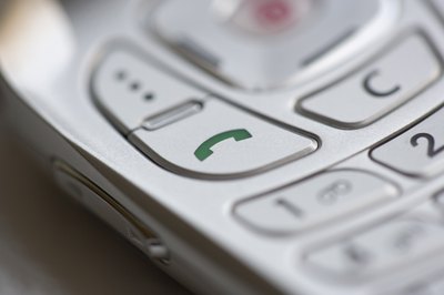 Jupiterimages/Comstock/Getty Images Cell phone plans aren't usually found on your credit report.