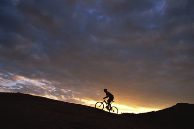 Comstock Images/Comstock/Getty Images Ride just as the sun rises to beat the heat.