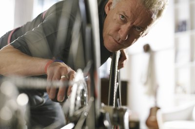 John Howard/Digital Vision/Getty Images Chain maintenance will extend the life of your bike.