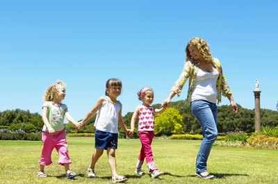Kane Skennar/Digital Vision/Getty Images Baby sitters should enjoy interacting with their charges.
