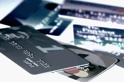 Medioimages/Photodisc/Photodisc/Getty Images Excessive use of credit cards can harm your credit.