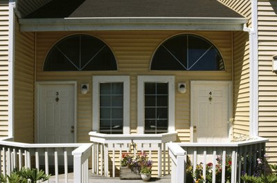 Ablestock.com/AbleStock.com/Getty Images Turn a duplex into a cozy vacation rental.