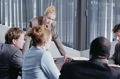 Polka Dot Images/Polka Dot/Getty Images If you work with a management team, you could also hold a group meeting to discuss problem employees.