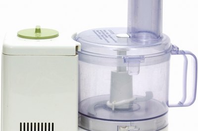Zedcor Wholly Owned/PhotoObjects.net/Getty Images A food processor or coffee grinder is the only tool necessary to meet your dog's culinary needs.