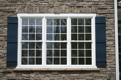 Jupiterimages/Comstock/Getty Images Choosing the right window could save your family hundreds of dollars a year in energy bills.