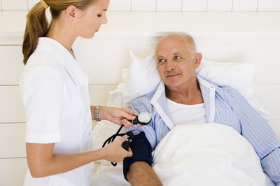 Jupiterimages/Pixland/Getty Images In most jurisdictions, nursing assistants must renew their license every two years.