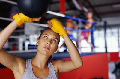 Stockbyte/Stockbyte/Getty Images A wide range of training drills can help you develop upper-body strength.