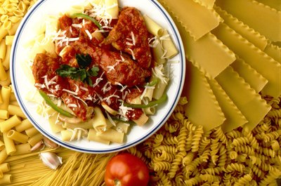 Jupiterimages/Photos.com/Getty Images Carbs such as pasta digest quicker than fat or protein.