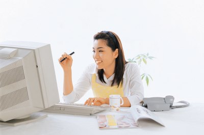 Photos.com/Photos.com/Getty Images An administrative assistant is on call for any office support task.