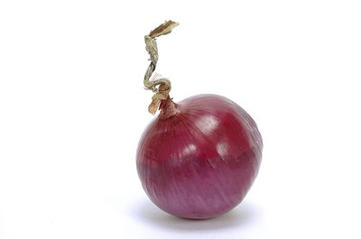 Ablestock.com/AbleStock.com/Getty Images Red onions contain significant health promoting compounds.