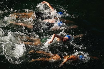 Brendon Thorne/Getty Images Sport/Getty Images Triathletes often use crossover kicking to keep their legs fresh for the biking and running legs of the race.