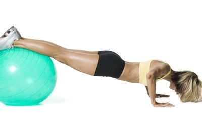 Photodisc/Photodisc/Getty Images No matter how advanced your pushups, you'll need separate exercises for your biceps.