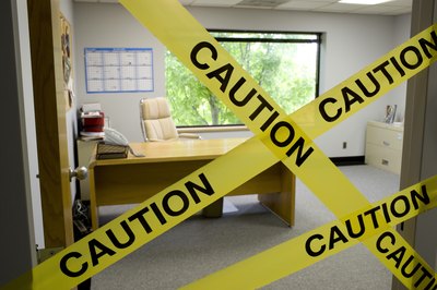 Creatas/Creatas/Getty Images Illegal activity in the workplace harms businesses.