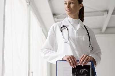 Creatas Images/Creatas/Getty Images Two to four years of post-secondary education is required for ultrasound techs.