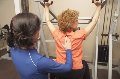 Brand X Pictures/Brand X Pictures/Getty Images Strengthening exercises can activate under-active muscles.