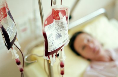 Jochen Sands/Digital Vision/Getty Images If you need a hospital stay overnight, federal law probably protects your job.