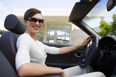 Goodshoot/Goodshoot/Getty Images Exercise your butt while driving.