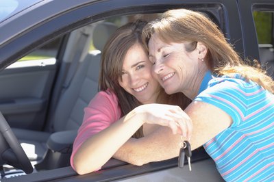 Jupiterimages/Brand X Pictures/Getty Images Give the gift of car ownership with a bill of sale.