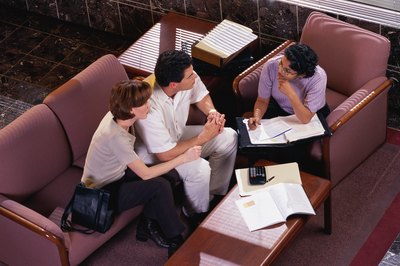 Stockbyte/Stockbyte/Getty Images The annuity company will often send a representative to ensure you understand the penalties for cancelling.