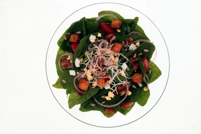 Jupiterimages/Comstock/Getty Images The iron in spinach is more bioavailable when the veggie is lightly cooked.