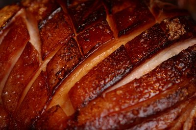 Jupiterimages/Photos.com/Getty Images Most pork is lean meat, but some types are high in cholesterol.