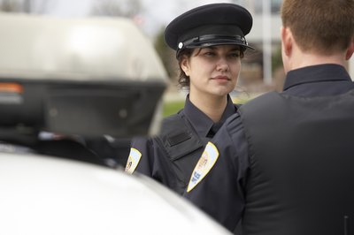 Jupiterimages/Photos.com/Getty Images Sergeant detectives serve both in uniform and in plainclothes.